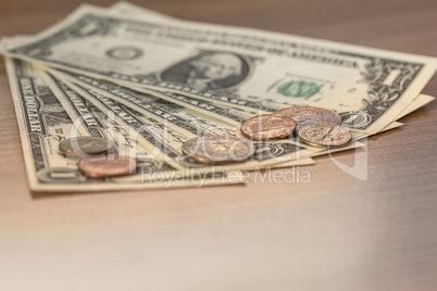 Closeup of Dollar Notes and Coins