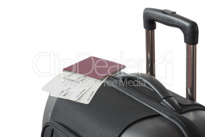 Detail of Trolley suitcase with passport