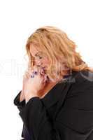 Business woman praying.