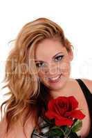 Blond woman with red rose.