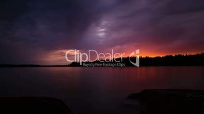 Cloudy sunset in a midsummer night at lake Vänern in Sweden