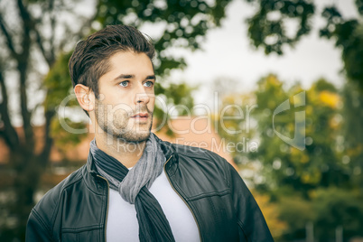 cool youngAn image of a young man with a black leather jacket man