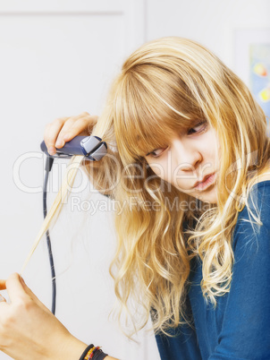 teenager smooting her hair
