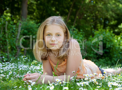 girl lying on a meadow