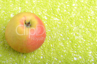 fresh apple on green background