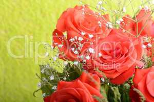 bouquet of blossoming dark red roses in vase, close up flower