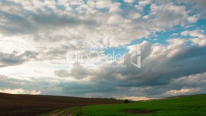 Dramatic Sky over the Endless Fields. Time Lapse
