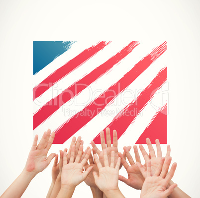 Composite image of people raising hands in the air