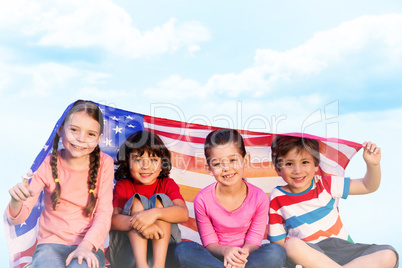 Composite image of children with american flag