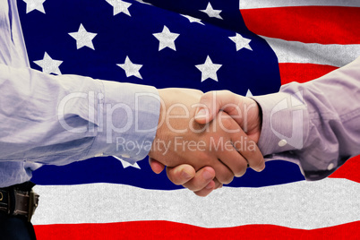 Composite image of two men shaking hands