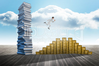 Composite image of geeky happy businessman running mid air