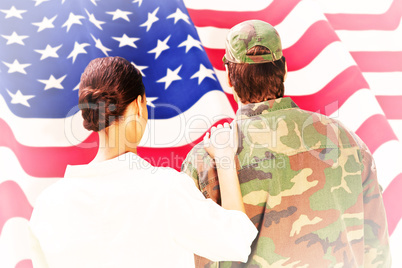 Composite image of army wife reunited with husband