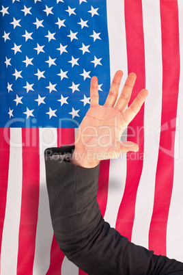 Composite image of businessman holding hand out in presentation