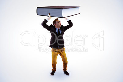 Composite image of businessman holding