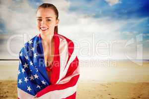 Composite image of pretty girl in bikini with american flag