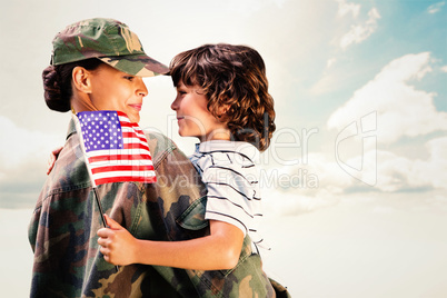 Composite image of solider reunited with son