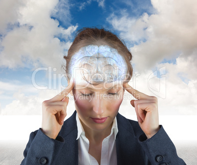Composite image of stressed businesswoman