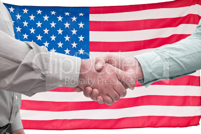 Composite image of men shaking hands