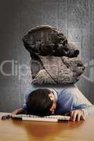 Composite image of businessman sleeping on his keyboard