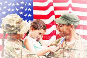 Composite image of soldiers reunited with daughter