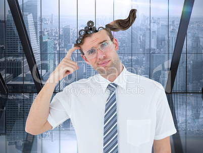 Composite image of geeky businessman thinking with finger on tem
