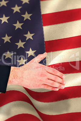 Composite image of hand of businessman offering handshake