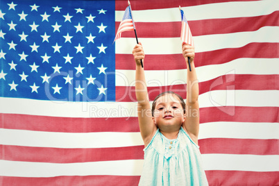 Composite image of cute girl with american flag