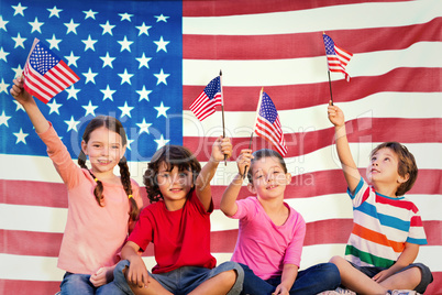 Composite image of children with american flags