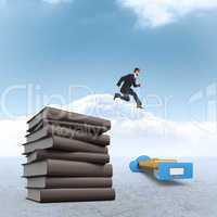 Composite image of geeky young businessman running mid air