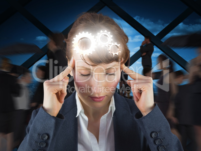 Composite image of stressed businesswoman