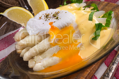 white asparagus served with a fine hollandaise sauce and Poache