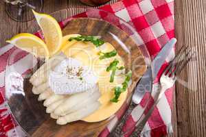 white asparagus served with a fine hollandaise sauce and Poache