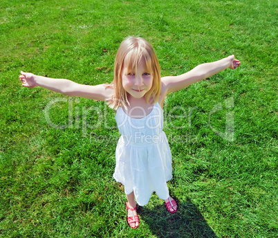 girl standing on a meadow