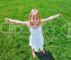 girl standing on a meadow
