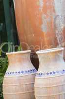 Trio of large decorative outdoor vases