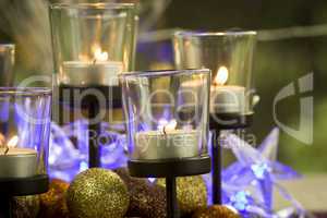 Christmas background with candles and baubles