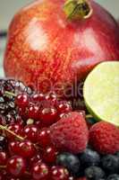 Assorted fresh fruit and berries on a plate