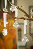 Faceted crystal Christmas decorations on a tree