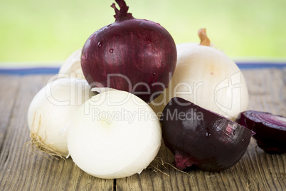 Pile of fresh cleaned red and white onions