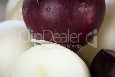 Pile of fresh cleaned red and white onions