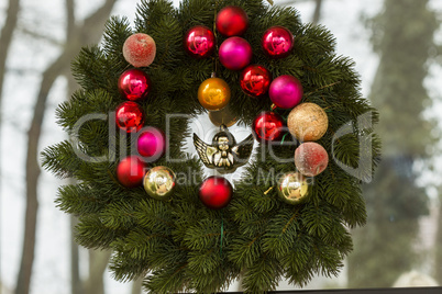 Hanging Christmas Wreath on Glass Window
