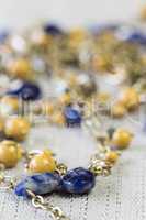 Gold Jewelry with Yellow and Blue Stone Accents