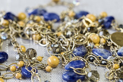 Gold Jewelry with Yellow and Blue Stone Accents