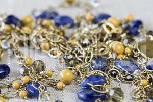 Gold Jewelry with Yellow and Blue Stone Accents