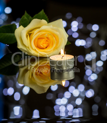 Rose, Candle and Jewelry Present Gift Box on Table