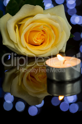 Rose, Candle and Jewelry Present Gift Box on Table