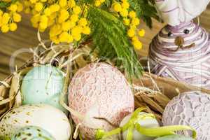 Hand decorated Easter Eggs in straw