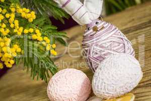 Hand decorated Easter Eggs in straw