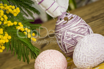 Hand decorated Easter Eggs in straw