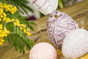 Hand decorated Easter Eggs in straw